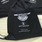 Tula promocional personalizada en tela quirúrgica, ligera y reutilizable, ideal para campañas institucionales, escolares y promocionales – Stamparbq Tiltex.